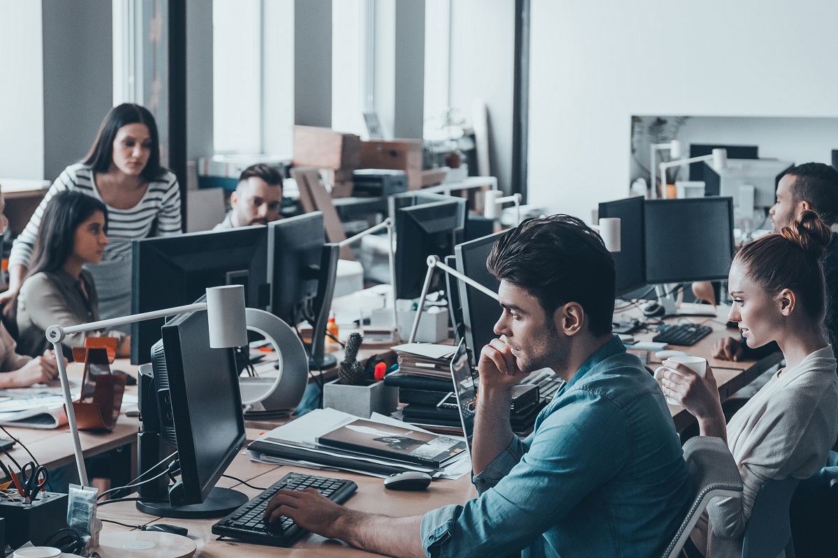 Employees working in an open space office