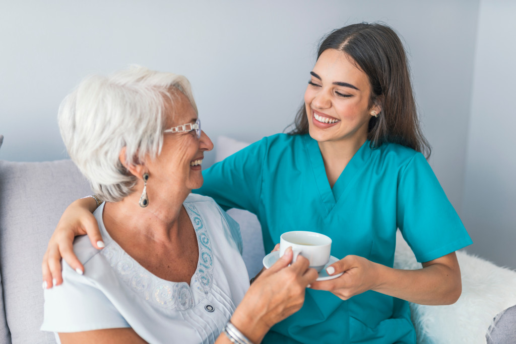 A home healthcare professional with patient