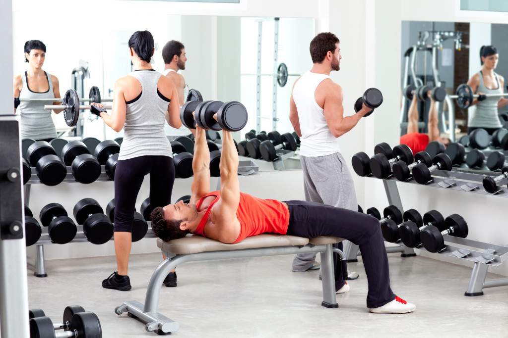 A group of people in sport fitness gym