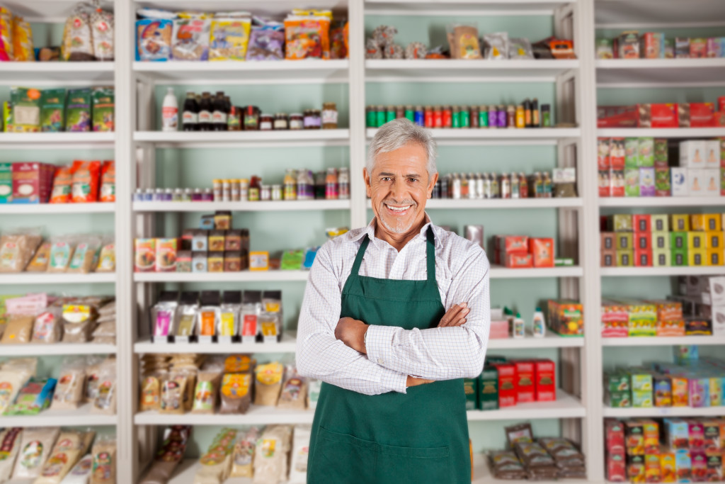 variety store owner smiling