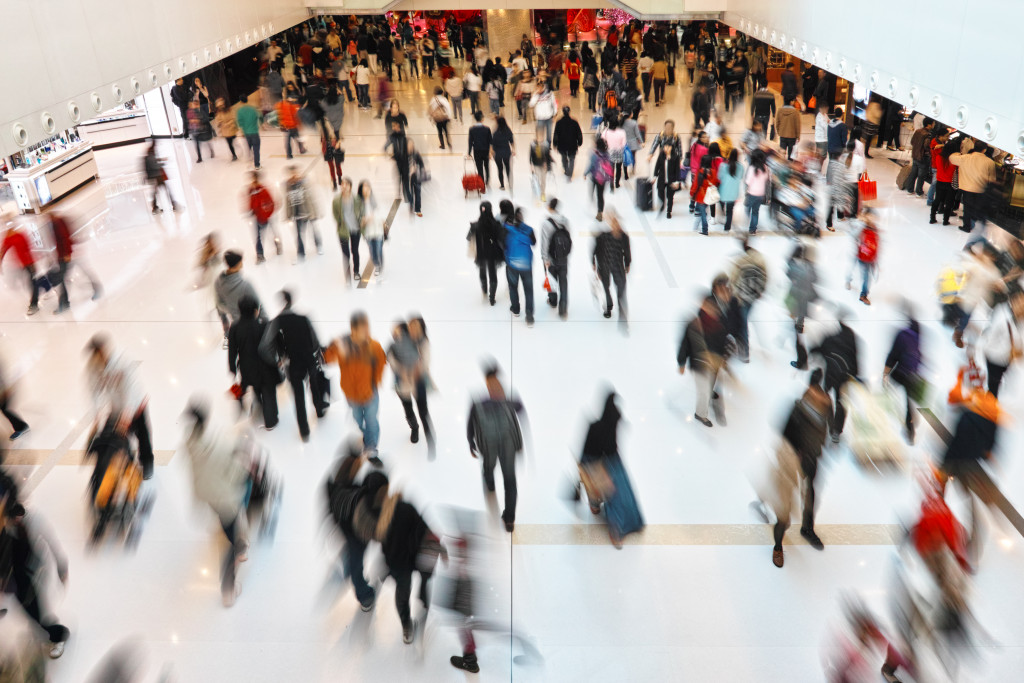 many people walking around the mall 