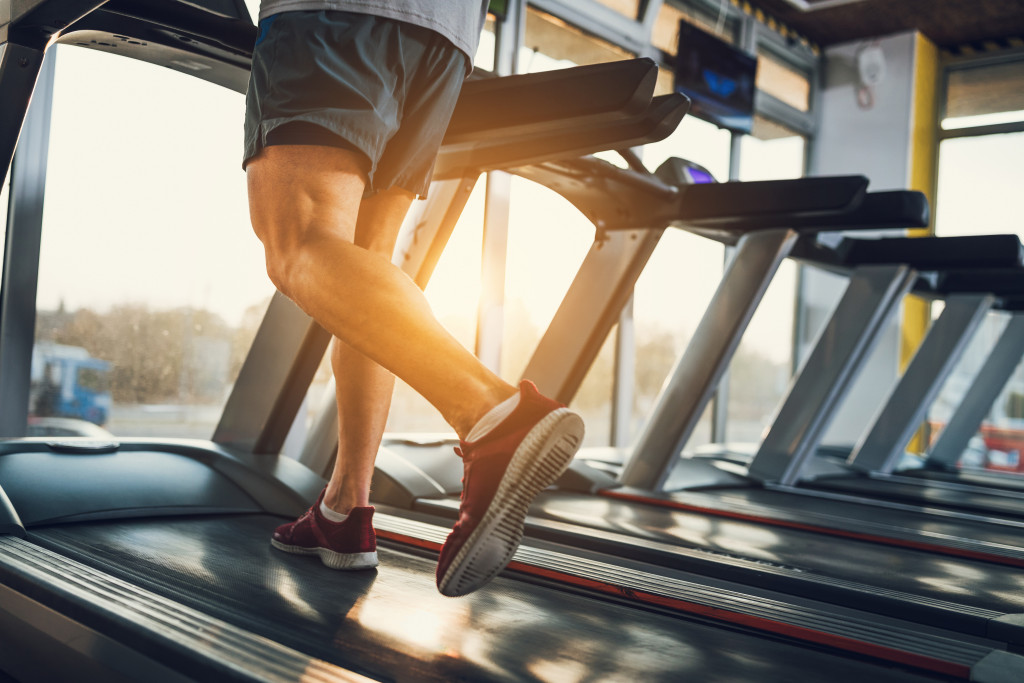 Man on a treadmill in a gym